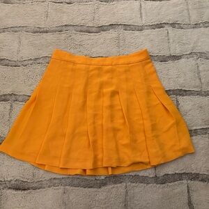 Vibrant Orange Pleated Skirt